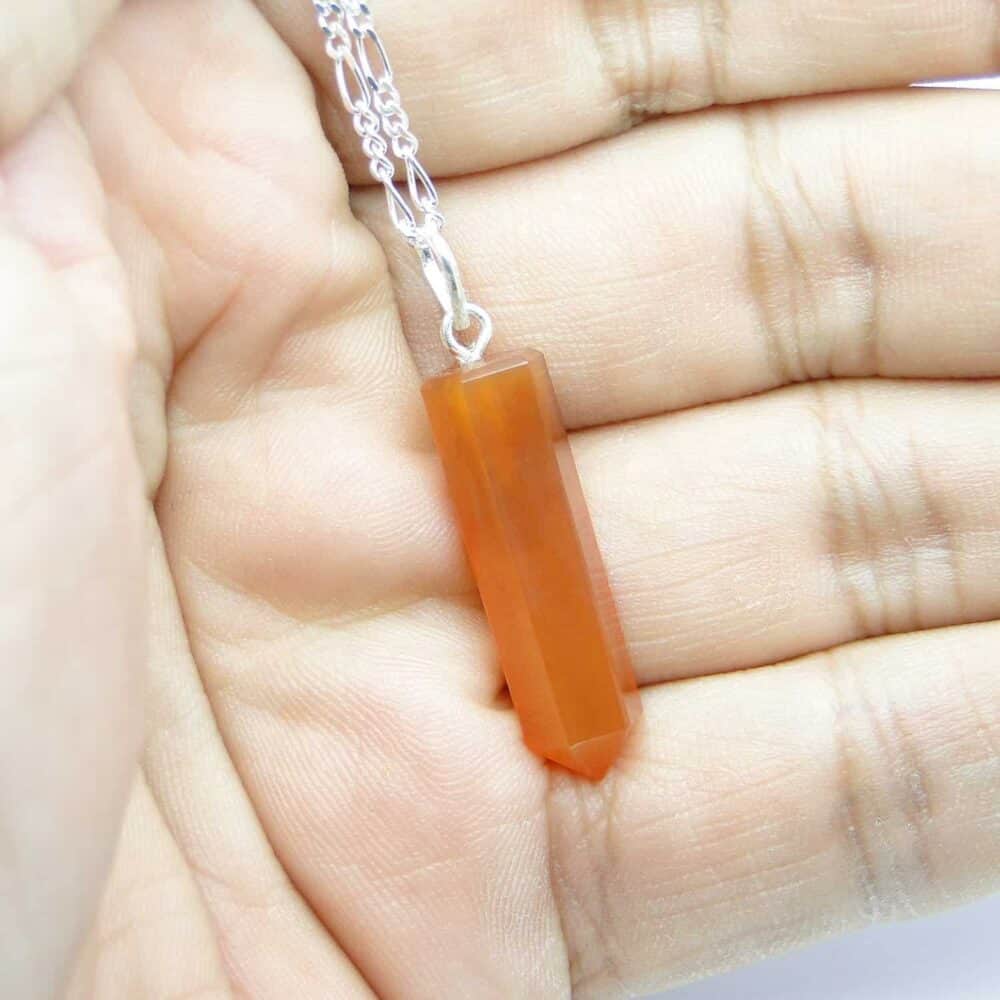 Nature's Crest - Red Carnelian Pencil Pendant - Red Carnelian Pencil Pendant Hand