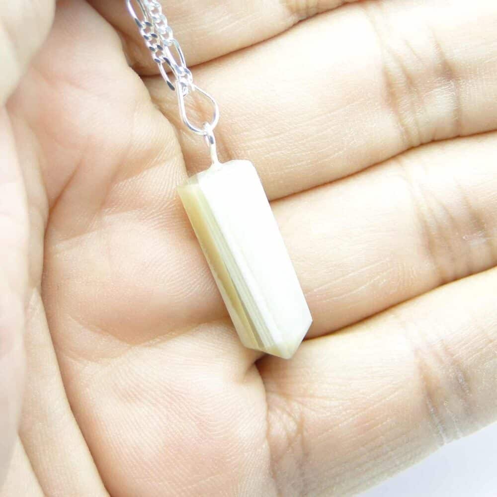 Nature's Crest - White Agate Pencil Pendant - White Agate Pencil Pendant Hand